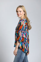 Multi-color Geometric Print - V Neck With Tassel | left side